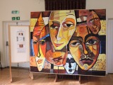 In 2011 this copy of an individual painting called 'Sad Masks' by Lidia Simeonova was assembled from 24 canvases painted by members of the Art Group without conferring.jpg